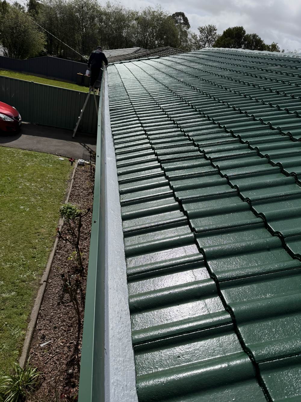 Roof and gutter inspection on a tiled roof in Narre Warren before repair