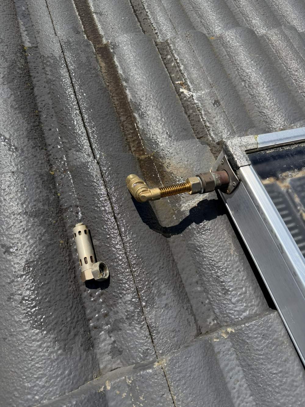 Damaged and leaking frost valve on a roof-mounted solar hot water system in Narre Warren